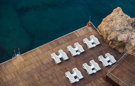 luxury hotel and sunbeds on the beachの写真素材