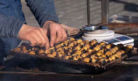 fried chestnut vendor, street food, kitchen scales,の写真素材