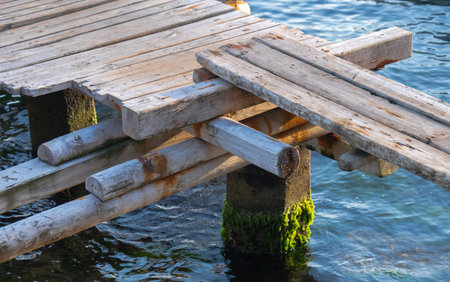 old and abandoned wooden pier by the sea.