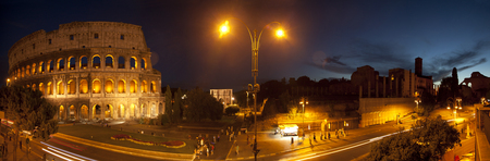 The Colosseum under the glow of lights at night, Romeのeditorial素材