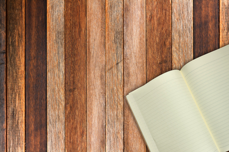 top view book with wood backgroundの写真素材