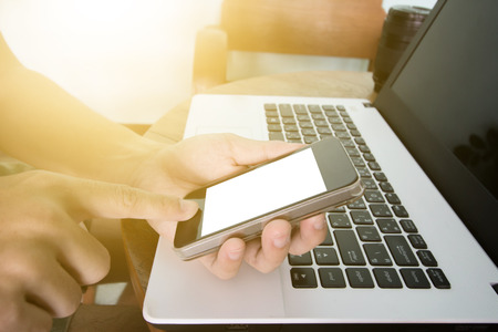 Finger press telephone on keyboard computer.business conceptの写真素材