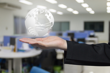 Earth on hand,  background office concepの写真素材
