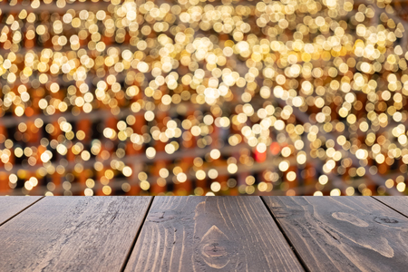 Empty wooden table of brown on front blurred colorful background, for presentation and advertising product and template, website bannerの写真素材