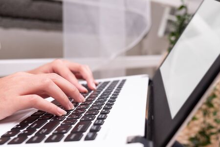Woman using laptop computer white screen, business, work, technologyの写真素材