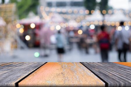 Emtpy wooden table of brown in front blurred background, can be use to advertising template and presentation your productの写真素材