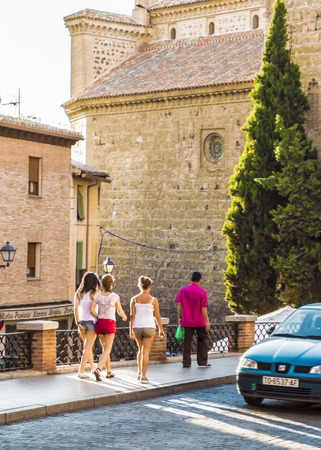 Toledo, Spain - July, 12, 2014  Tourists visiting the ancient city of Toledo at sunsetのeditorial素材