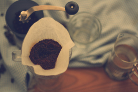 set of coffee equipment , drip coffee in retro filter effectの写真素材