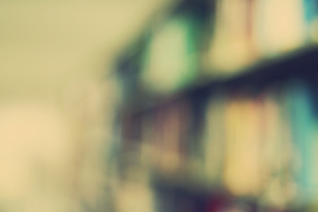 Blured books in public library. Blured effect. Background for you picturesの写真素材