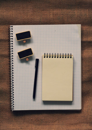 Top view of notebook paper with copy space for text in retro filter effect