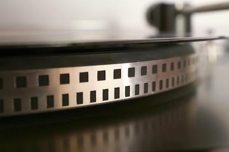 old gramophone turntable with disc, detail, photoの写真素材