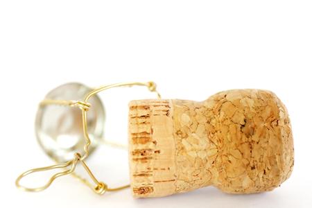 cork from champagne bottle on white backgroundの写真素材