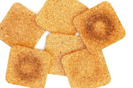 five cork drink coasters on white backgroundの写真素材