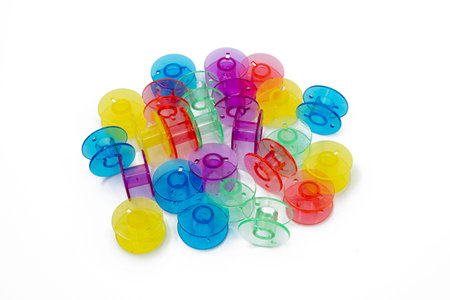 Colorful bobbin sewing machine part