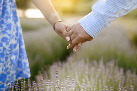 Close-up of the hands of a couple in loveの写真素材