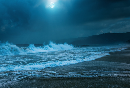 Night storm on Karon beach. Phuket Island in Thailand.の写真素材