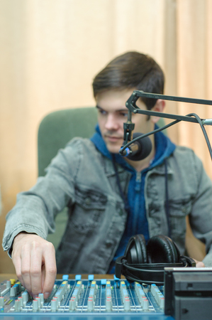 Portrait of a broadcaster in the studioの写真素材