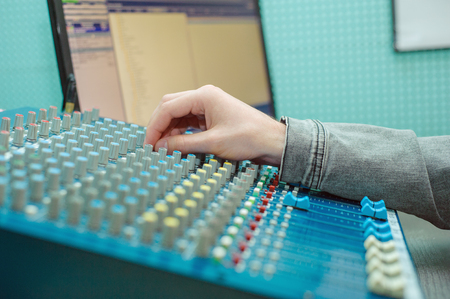 Portrait of a broadcaster in the studioの写真素材