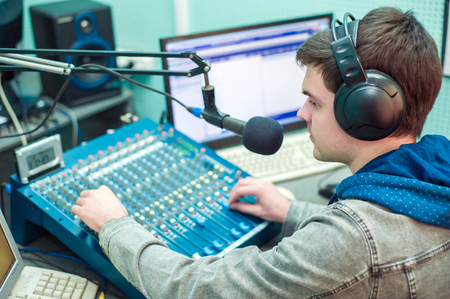 Portrait of a broadcaster in the studioの写真素材