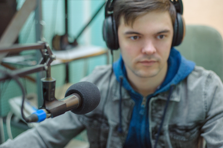 Portrait of a broadcaster in the studioの写真素材