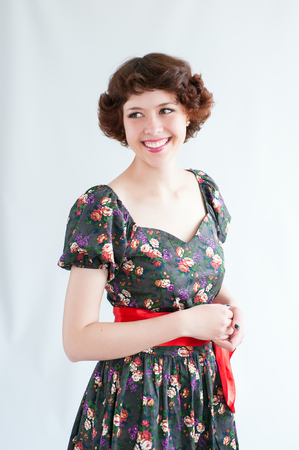 Portrait of a young beautiful smiling girlの写真素材