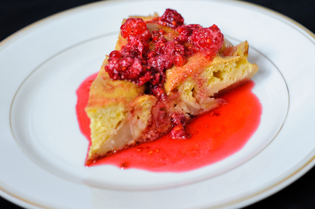 fruit pie with raspberry jam on a dark backgroundの写真素材