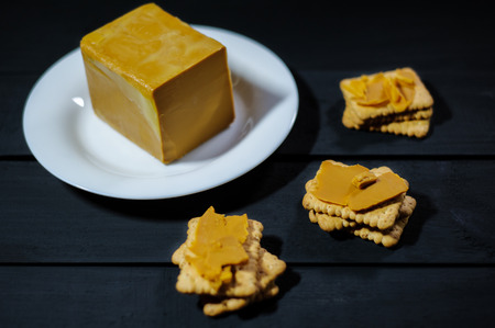 traditional scandinavian organic brown cheese brunost. Healthy Breakfast or snack. Healthy food and eating.の写真素材