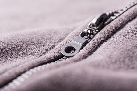 Gray plastic zipper opening jacket