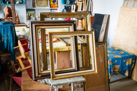 Old wooden painting frames in painter studioの写真素材