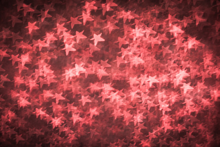 Abstract defocused red background for christmass cardsの写真素材