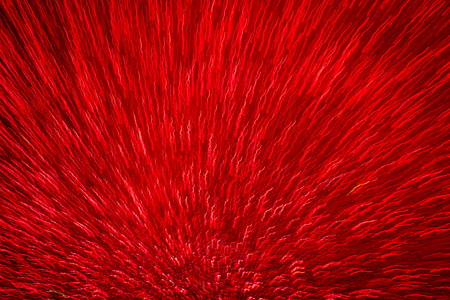 Abstract defocused red background for christmass cardsの写真素材