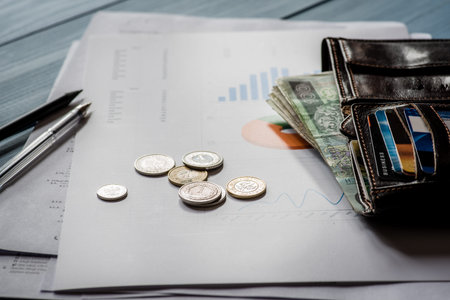 Polish money, notes and coins on the desk. Financial concept.