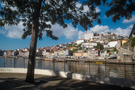 Colorful houses of Ribeira Square located in the historical center of Porto, Portugal along the river Douroの写真素材
