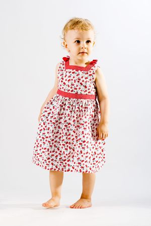 Young adorable girl dressed up in the studioの写真素材