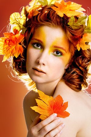 Autumn portrait of a beautiful female modelの写真素材