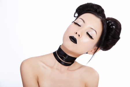 Young asian female with creative black makeupの写真素材