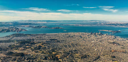 Panoramic aerial view of San Francisco wide area with bay and bridgesの写真素材