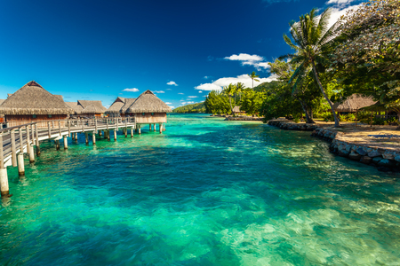 Over water bungalow with steps into amazing lagoon, Moorea, Tahitiの写真素材