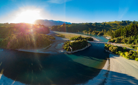 Bridges over Rakaia river, Rakaia Gorge, New Zealand, South Island, during sunsetの写真素材