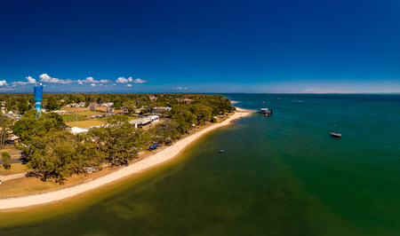Aerial drone view of Bongaree Jetty on Bribie Island, Sunshine Coast, Queensland, Australiaの写真素材