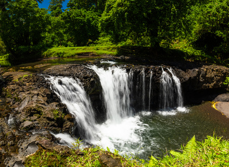 Vibrant Togitogiga falls with swimming hole on Upolu, Samoa Islandsの写真素材