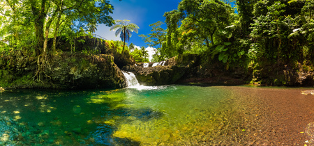 Vibrant Togitogiga falls with swimming hole on Upolu, Samoa Islandsの写真素材