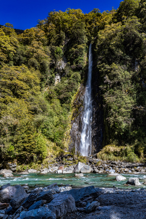 Thunder Creek Waterfall in Mt Aspiring National Park, Haast Pass, West Coast Region, South Island, New Zealandの写真素材