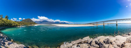New Zealand's longest one-lane bridge over the Haast River, South Westlandの写真素材