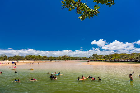 CALOUNDRA, AUS - Jan 20 2019: Hot sunny day at tropical Currimundi Lake Beach Calundra, Queensland, Australiaのeditorial素材