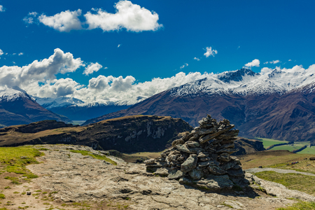 Rocky Mountain and Diamond Lake in the Mt Aspiring National Park near Wanaka, New Zealandの写真素材