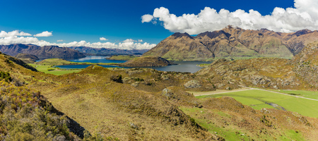 Rocky Mountain and Diamond Lake in the Mt Aspiring National Park near Wanaka, New Zealandの写真素材