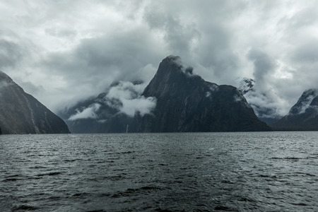 Cloudy and rainy day at amazing and vibrant Milford Sound, South Island, New Zealandの写真素材