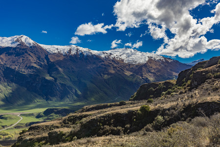 Rocky Mountain and Diamond Lake in the Mt Aspiring National Park near Wanaka, New Zealandの写真素材
