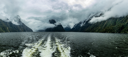 Cloudy and rainy day at amazing and vibrant Milford Sound, South Island, New Zealandの写真素材